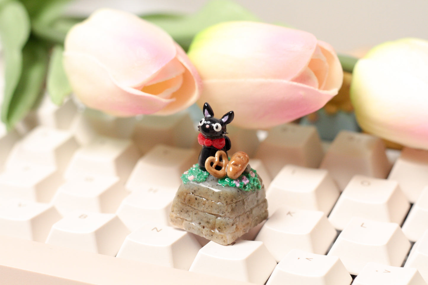 Jiji the cat from Kiki's Delivery Service.